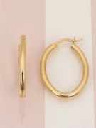 Złote kolczyki owalne kółka 585 widok z góry i boku