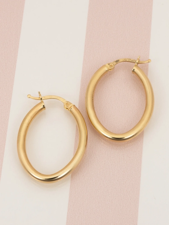 Złote kolczyki owalne koła 585 widok z boku